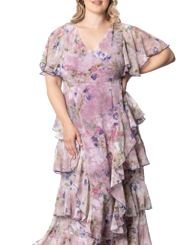 Front of a model wearing a size 4X Tour de Flounce Chiffon Evening Gown in LILAC FLORAL PRINT by Kiyonna. | dia_product_style_image_id:353026